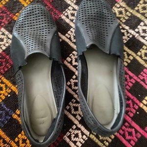 Eileen Fisher perforated black leather slip-ons